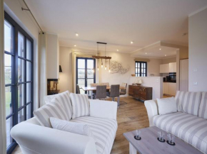 Reetland am Meer - Premium Reetdachvilla mit 3 Schlafzimmern, Sauna und Kamin F04